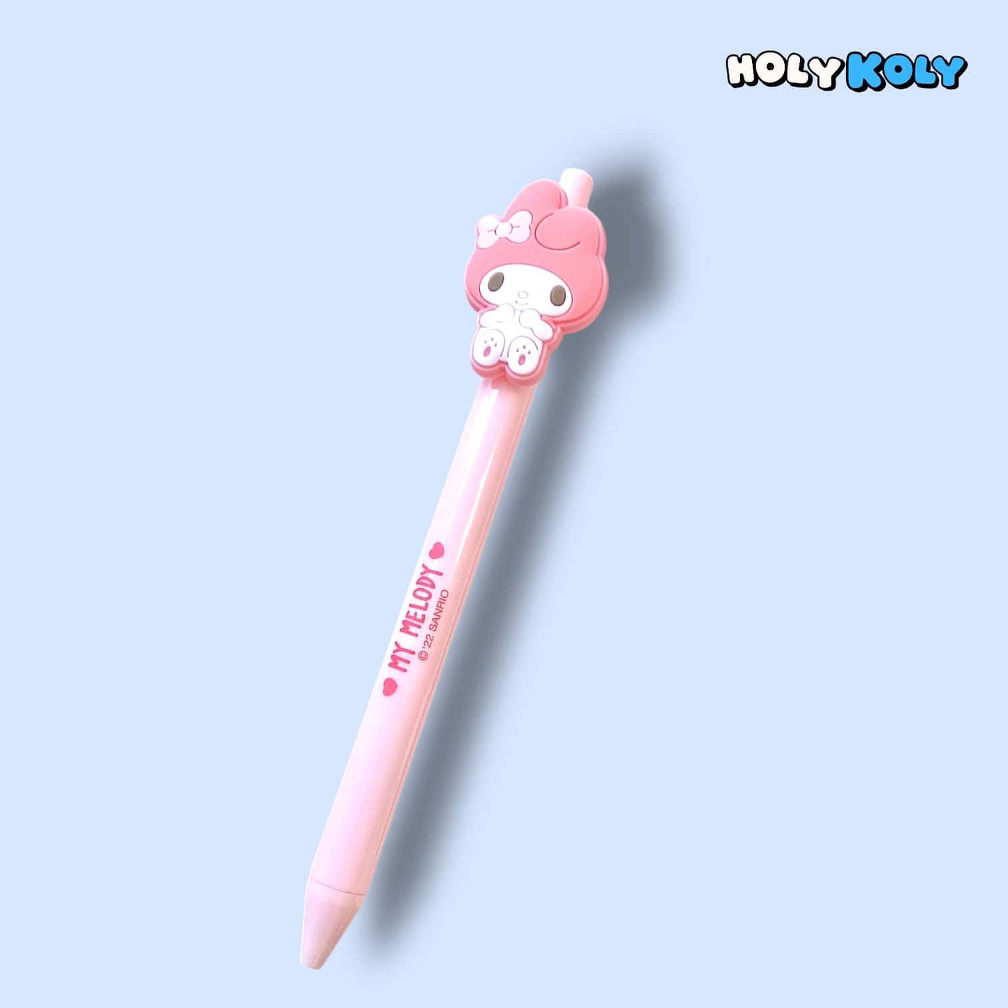 daiso korea sanrio pink ballpoint pen with My Melody topper and bold logo, angled view