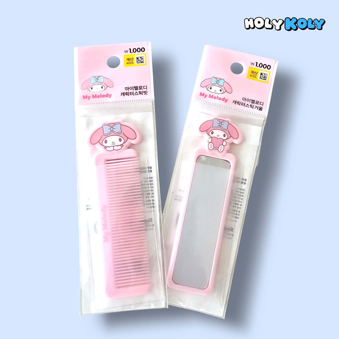 daiso korea sanrio grooming set featuring pink My Melody comb and matching stick mirror in packaging