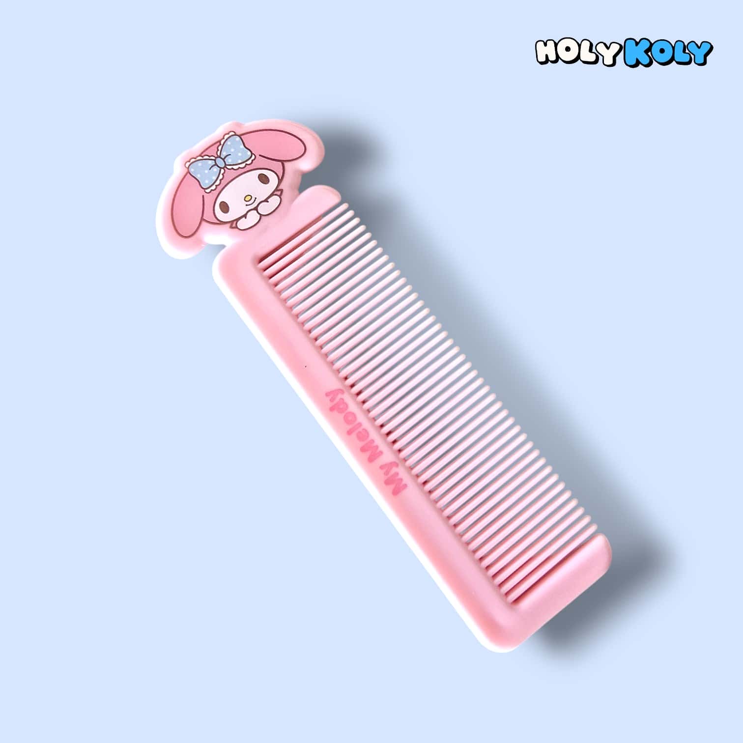daiso korea sanrio My Melody pink hair comb angled view with engraved branding and character topper