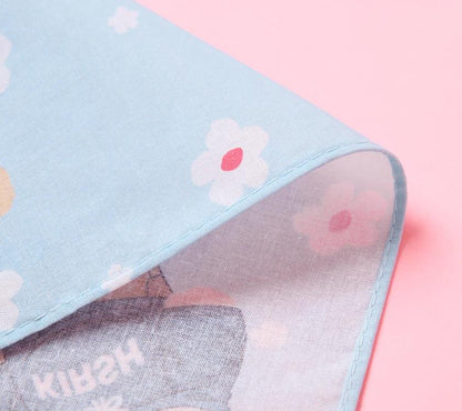Flat lay of blue and green Witty Bunny cotton handkerchiefs with cherry details, cute bunny handkerchief
