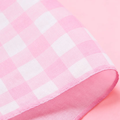 How to use a cotton handkerchief: pink check hanky folded small and tucked into a tote pocket