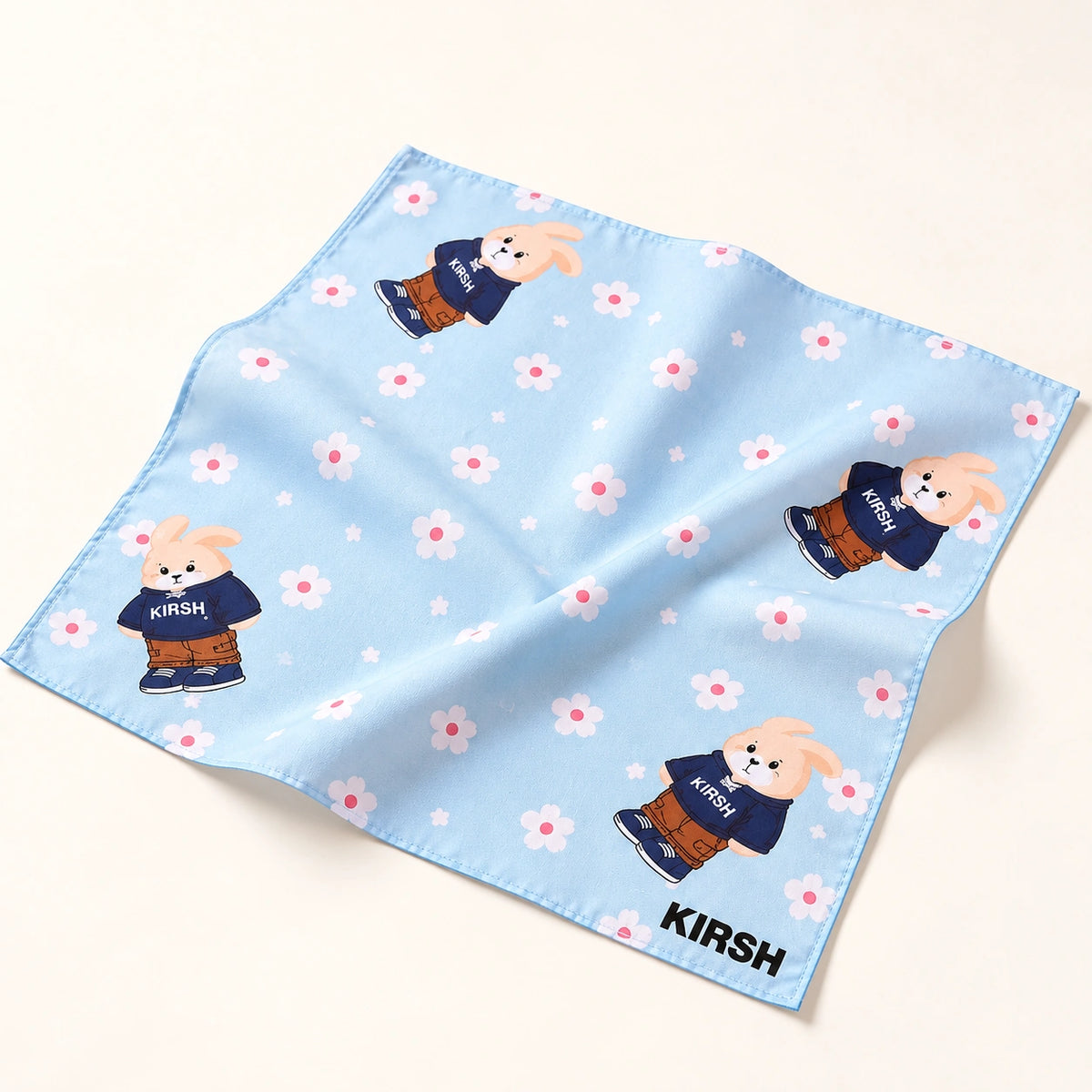 Flat lay of blue and green Witty Bunny cotton handkerchiefs with cherry details, cute bunny handkerchief