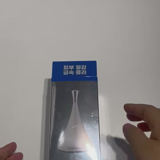 under eye cooling tool with ergonomic handle