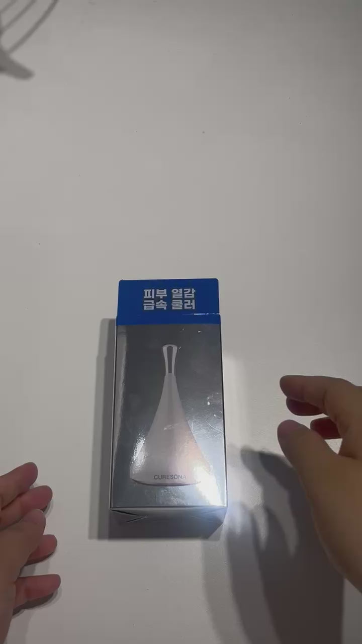 under eye cooling tool with ergonomic handle